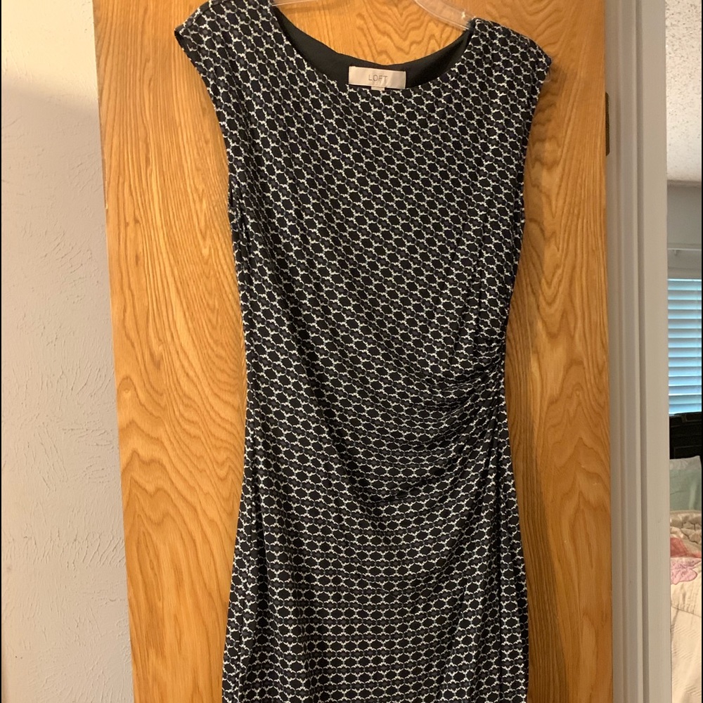 NWOT never worn, dress is below knee